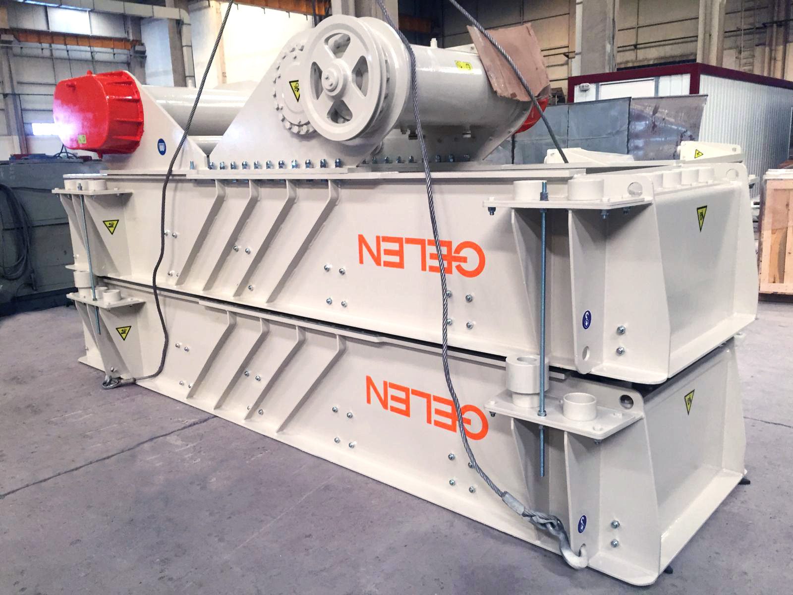 Two GELEN TB vibrating feeders with red vibrator motor covers ready for dispatch
